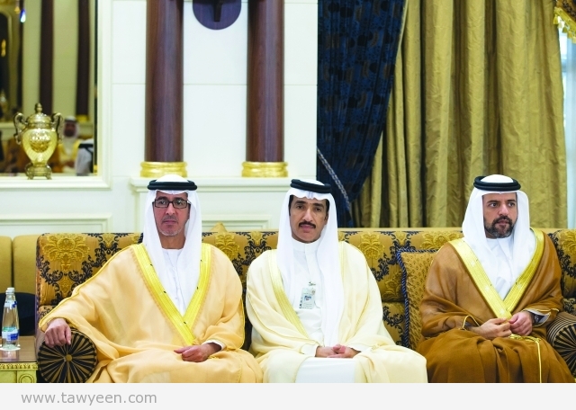 ABU DHABI, UNITED ARAB EMIRATES - July 17, 2015: HH Sheikh Rashid bin Hamdan bin Mohamed Al Nahyan (L), HE Ahmed Juma Al Zaabi Deputy Minister of Presidential Affairs (C), and HH Sheikh Mohamed bin Saif bin Mohamed Al Nahyan (R), attend an Eid Al Fitr reception at Mushrif Palace. ( Ryan Carter / Crown Prince Court - Abu Dhabi ) ---