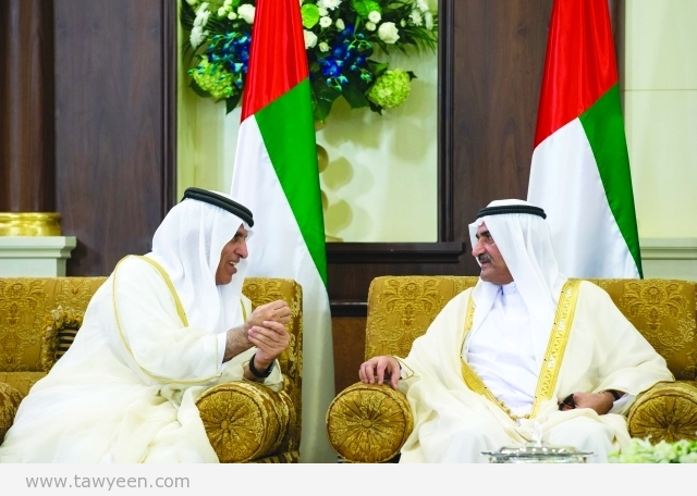 ABU DHABI, UNITED ARAB EMIRATES - July 17, 2015: HH Sheikh Saud bin Saqr Al Qasimi UAE Supreme Council Member and Ruler of Ras al-Khaimah (L), speaks with HH Sheikh Hamad bin Mohammed Al Sharqi UAE Supreme Council Member and Ruler of Fujairah (R), during an Eid Al Fitr reception at Mushrif Palace. ( Ryan Carter / Crown Prince Court - Abu Dhabi ) ---